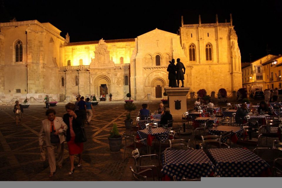 Spanish courtyard at night lit up beautifully