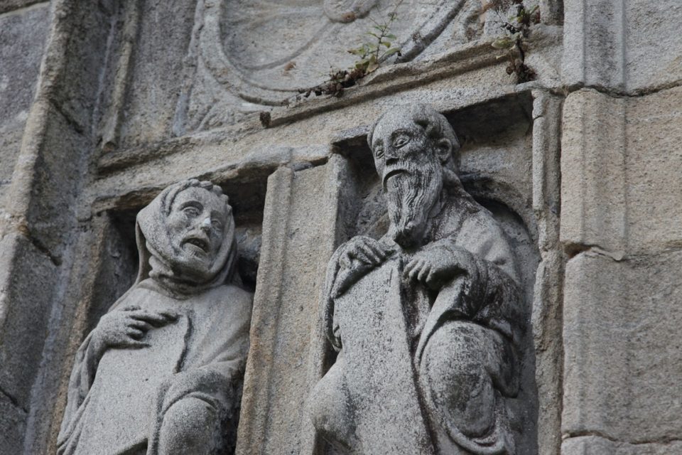 Stone carvings in side of cathedral Camino Frances, Spain