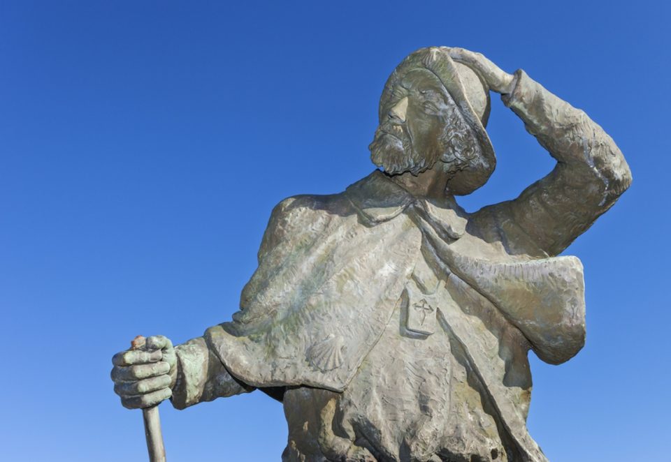 Statue with blue sky in background