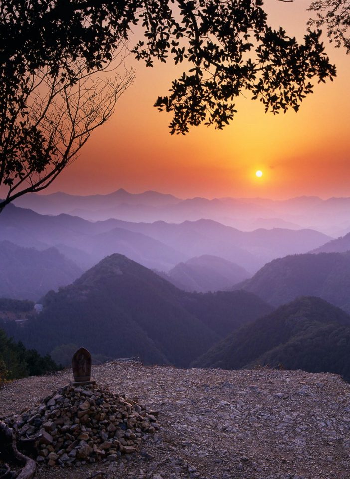 Amazing orange and purple sunset over mountains in Japan