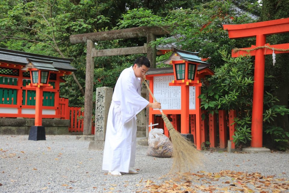 Traditional Japanese woman in traditional dress at one of the many Ancient Temples along Kumano Kodo.