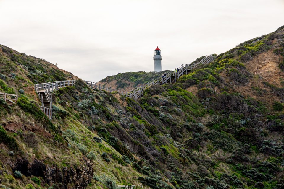 Lighthouse in the distance past the sand dunes on the Mornington Peninsula
