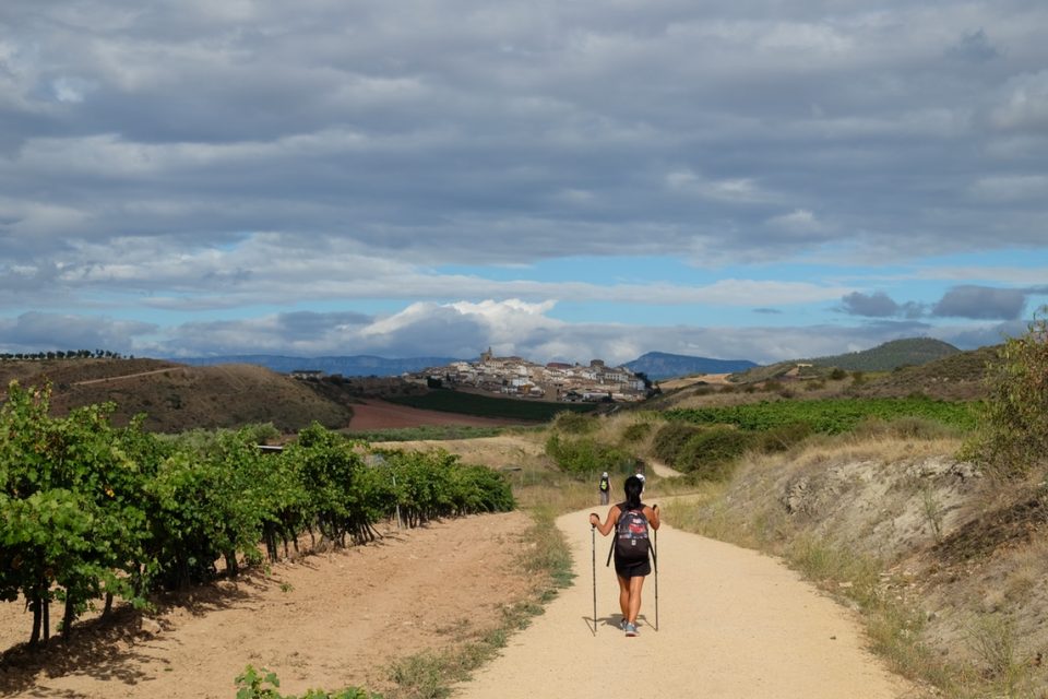 Camino hiker walking along the Camino route to Santiago