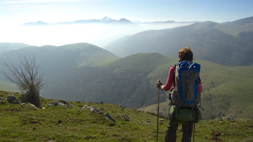 hiker looking out over the mountains in Spain