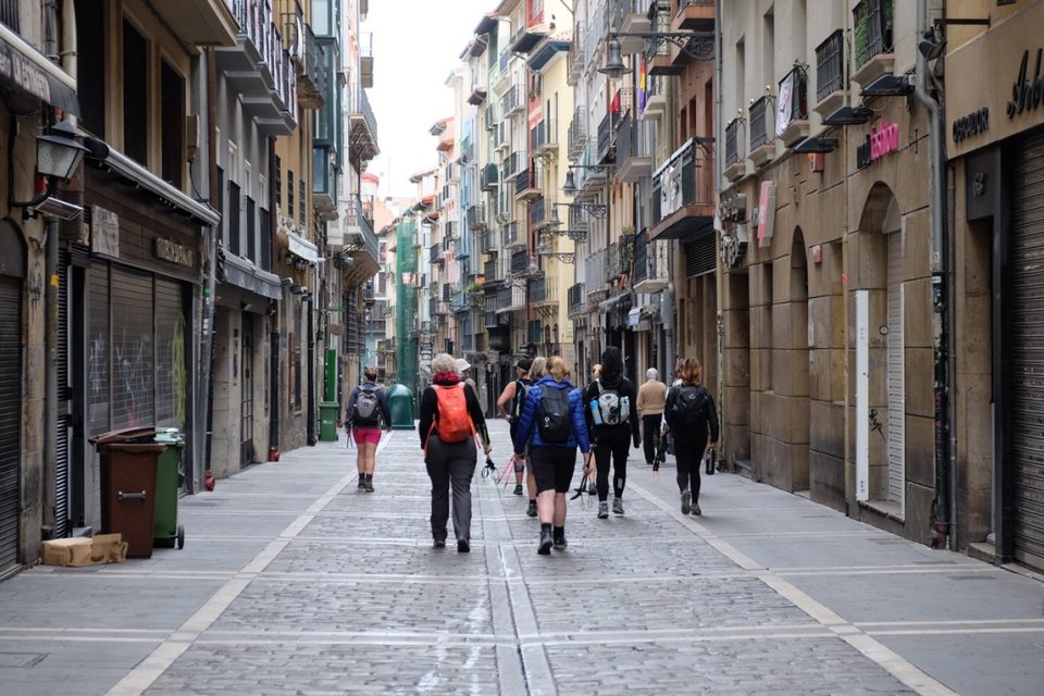 Walkers in town in Spain