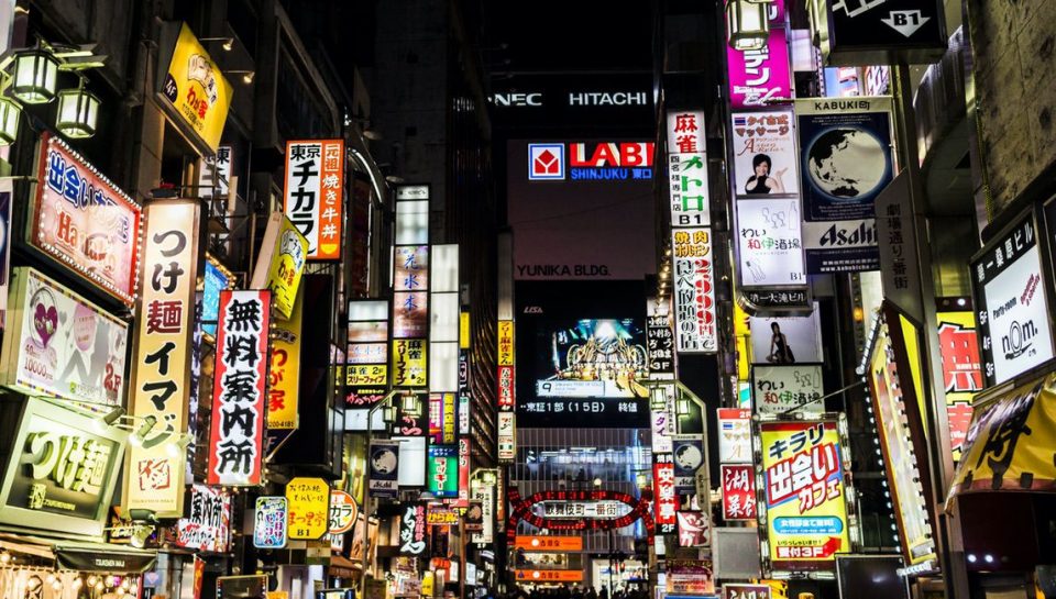 Neon advertisements at night in Kabukicho Shinjuku Tokyo Japan. Kabukicho is one of the most known red light districts in the world. Not only sex related business but also gambling, restaurants shops and other business thrive in these streets that are very known for the hostess and host clubs. Although prostitution in Japan is illegal many legal holes and loose enforcement have not affected the sex industry. Prostitution can only be prosecuted if there is coitus involved. All other kinds of paid sexual activity cannot be prosecuted under the Anti Prostitution law approved in 1956.
