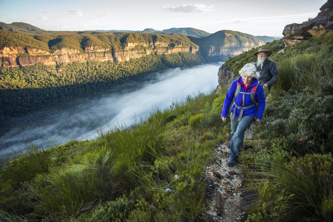 Senior Couple Bushwalking in Spectacular Blue Mountains Australian Landscape Senior couple bushwalking in the spectacular Australian Blue Mountains