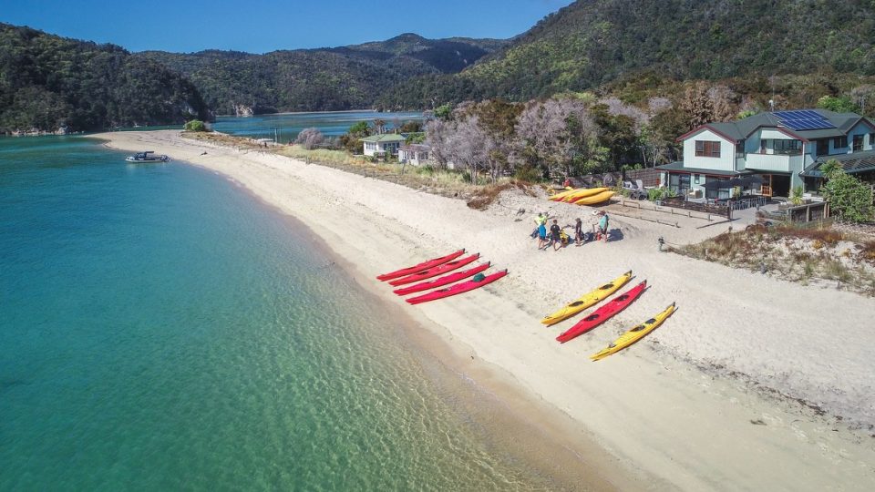 Long stretch of white sandy beach with turquoise waters