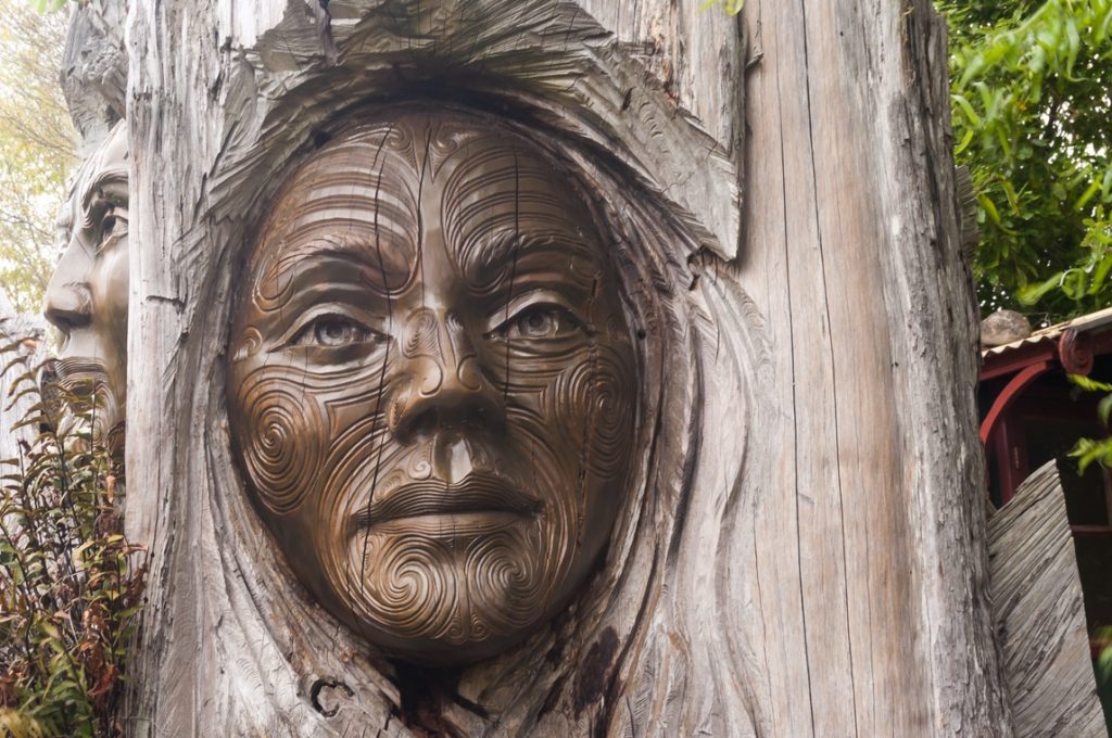 Close up of Maori sculpture at the entrance to the Abel Tasman National Park
