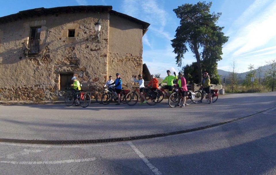 A group of cyclists taking a rest break in a Spanish town on the Camino
