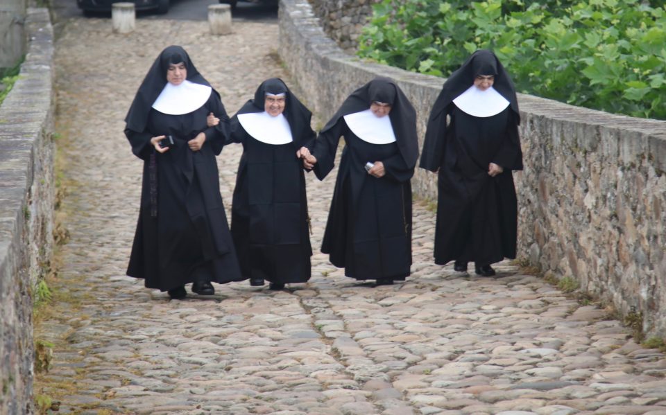 4 nuns on a trail along the Camino del Norte.