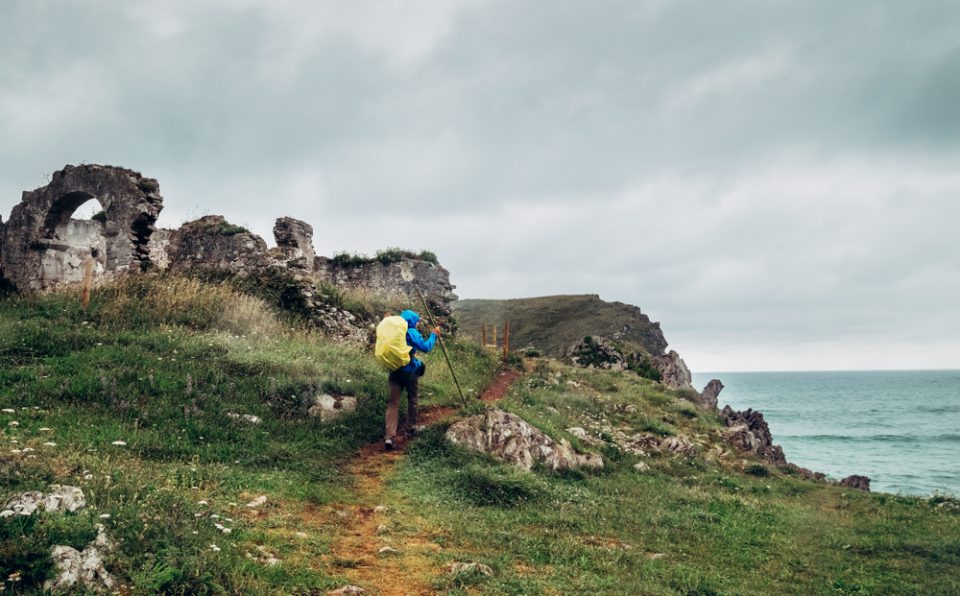 Traveler,On,The,Sea,Coast,,North,Spain A walker along the path of the Camino del Norte.