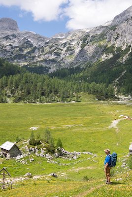 Hiker looking out at amazing Slovenian scenery