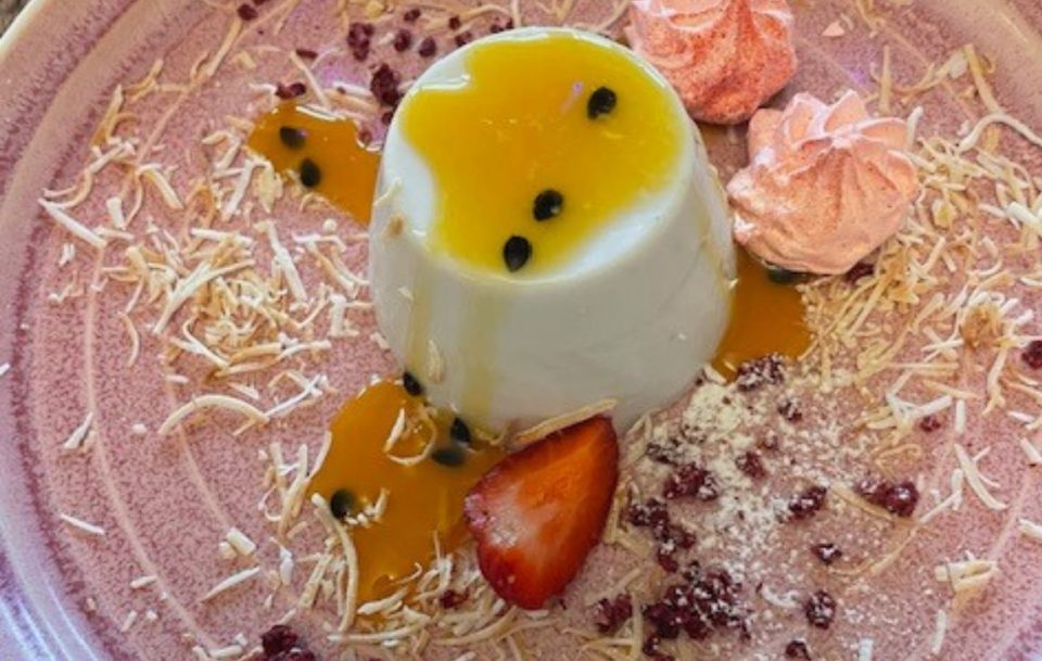 Dessert with passionfruit and strawberries