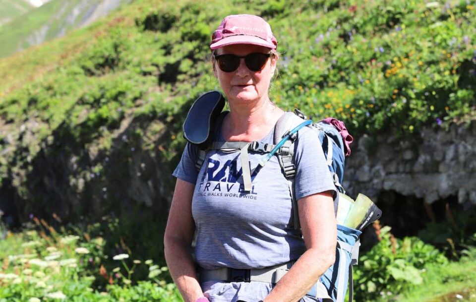 Trip leader for Mont Blanc treks wearing a RAW Travel branded t-shirt