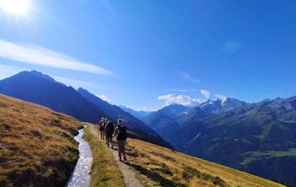 Hikers walking the Haute Route Switzerland