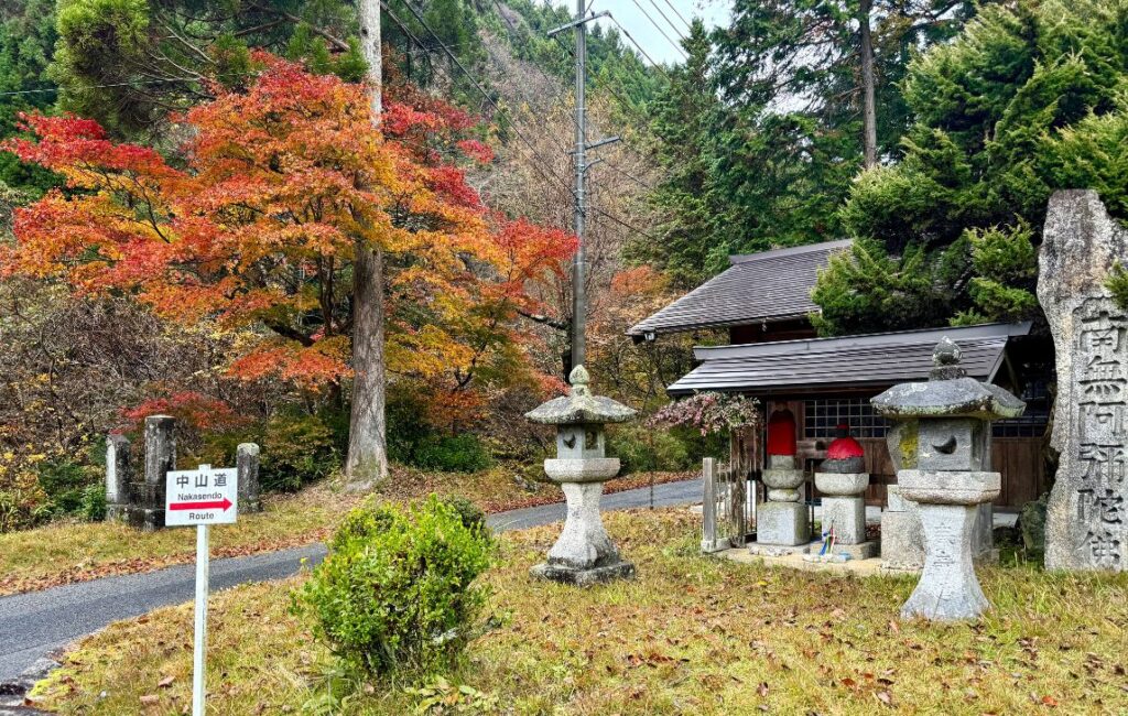 Autumn foliage on the trees along with temples along the Nakasendo Trail, Japan.