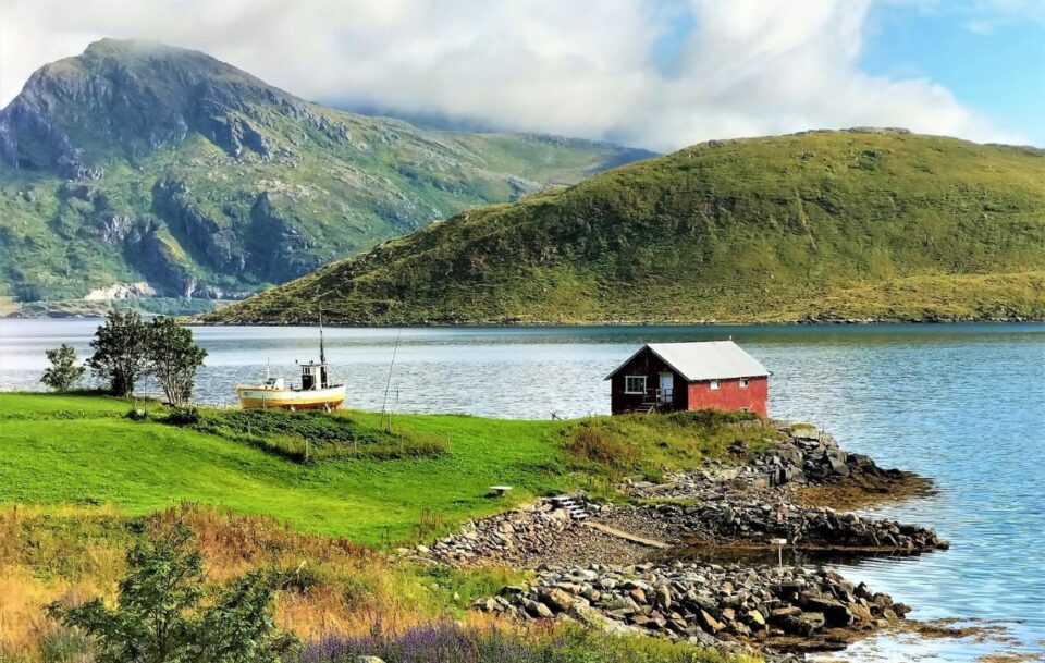 Fishing hut red on coastline Norway