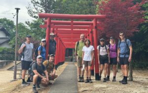 Group Hikers Red Temple Path Nakasendo Way Japan