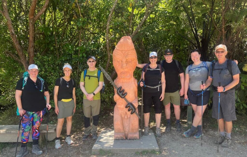Group of hikers about to set off on the Queen Charlotte Track hike in New Zealand.
