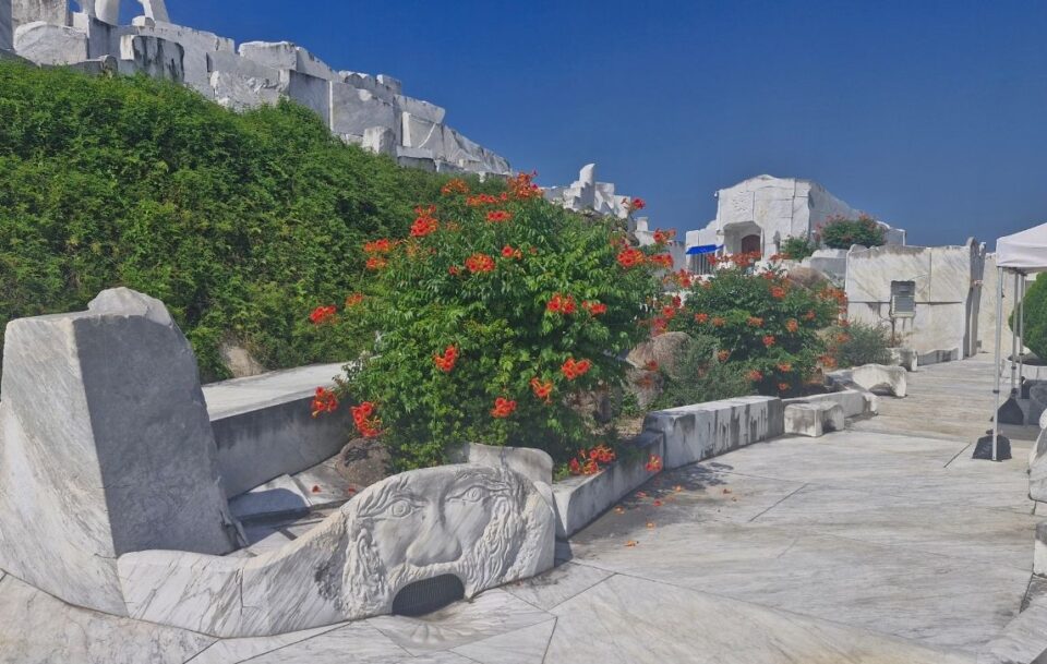 White marble monuments set amongst lush greenery at the Hill of Hope, Kosanji Buddhist temple, Hiroshima, Japan