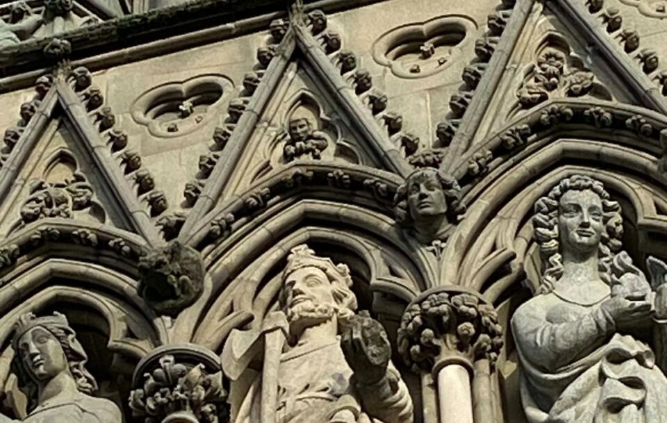 Intricate stonework on the exterior of the Nidaros Cathedral in Trondheim, Norway