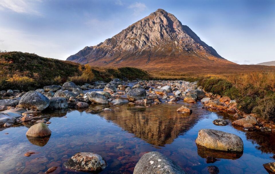 Striking Glencoe mountain rising above Loch Leven on the West Highland Way in Scotland.
