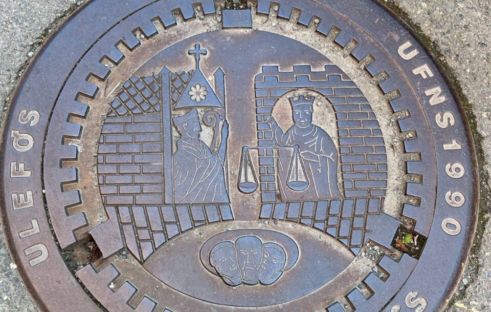 Distinctive drain cover with motif, St Olav's Way, Norway.