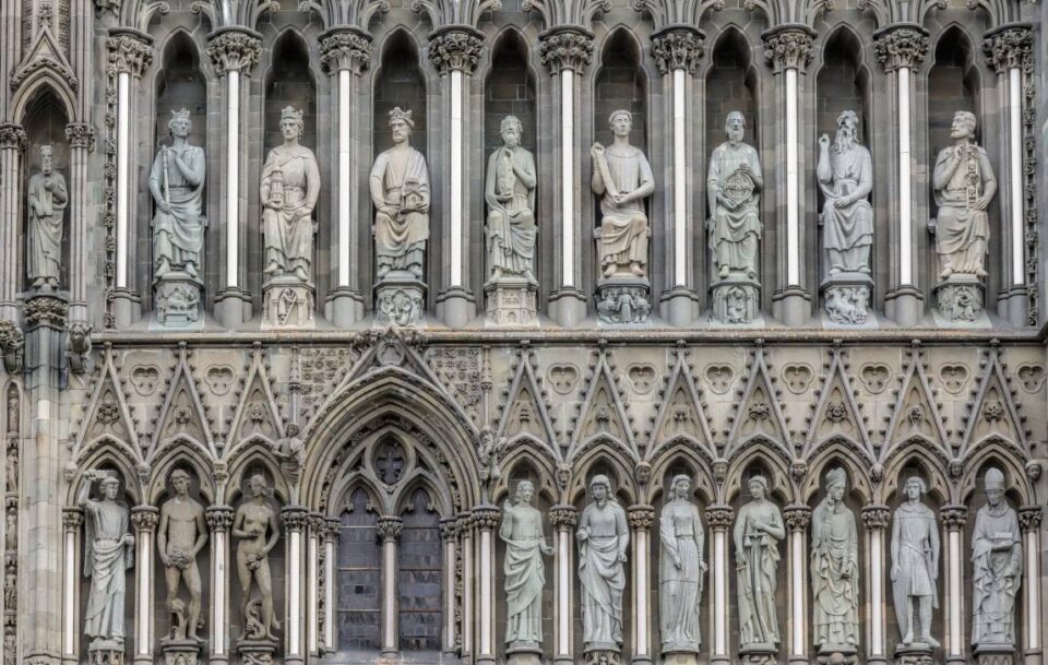 Detailed stone relief on the facade of Nidaros Cathedral, Trondheim.
