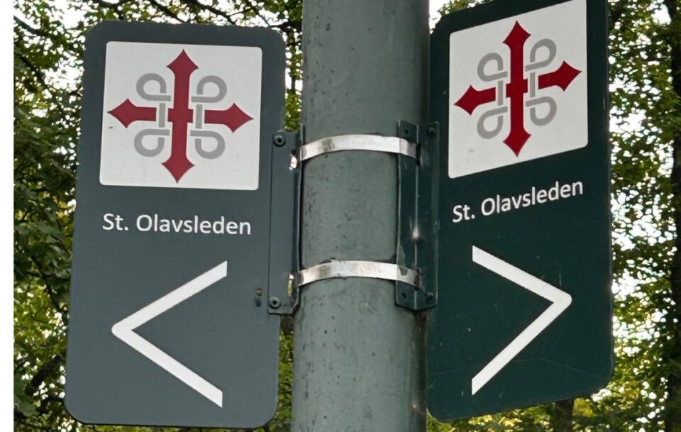 Close-up of St Olav’s Way metal street signs in Trondheim, Norway.