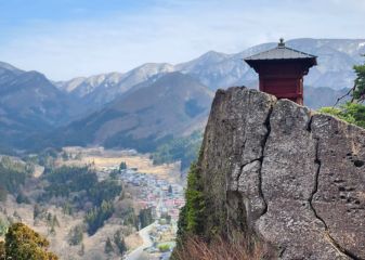 Dewa Sanzan pilgrimage walk in Japan - view from temple loking down over the valley and town.