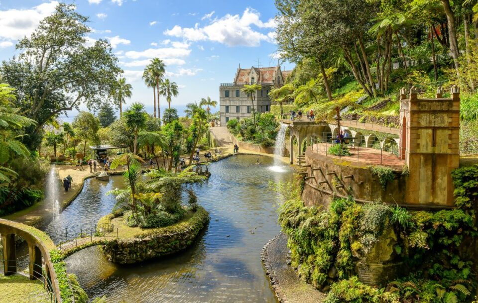 Lush tropical plants and ornate features at Monte Palace Gardens, Madeira.