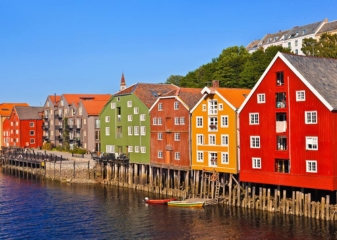 Colourful houses on the riverbank in Trondheim, Norway