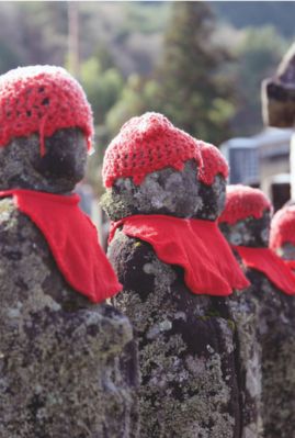 Stone statues in shrine Japan