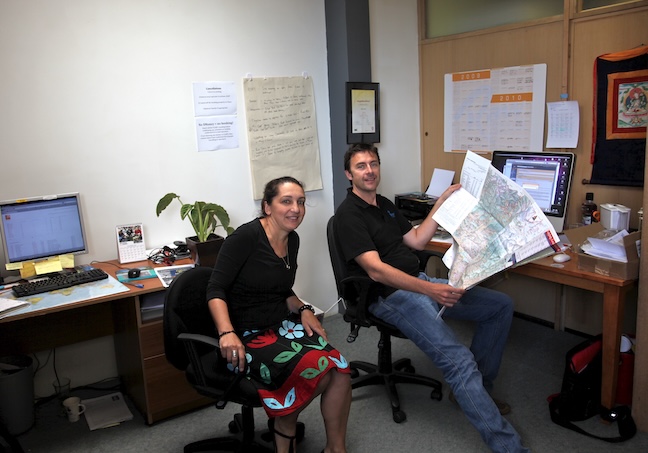 Early days in the RAW Travel office planning trips with paper maps